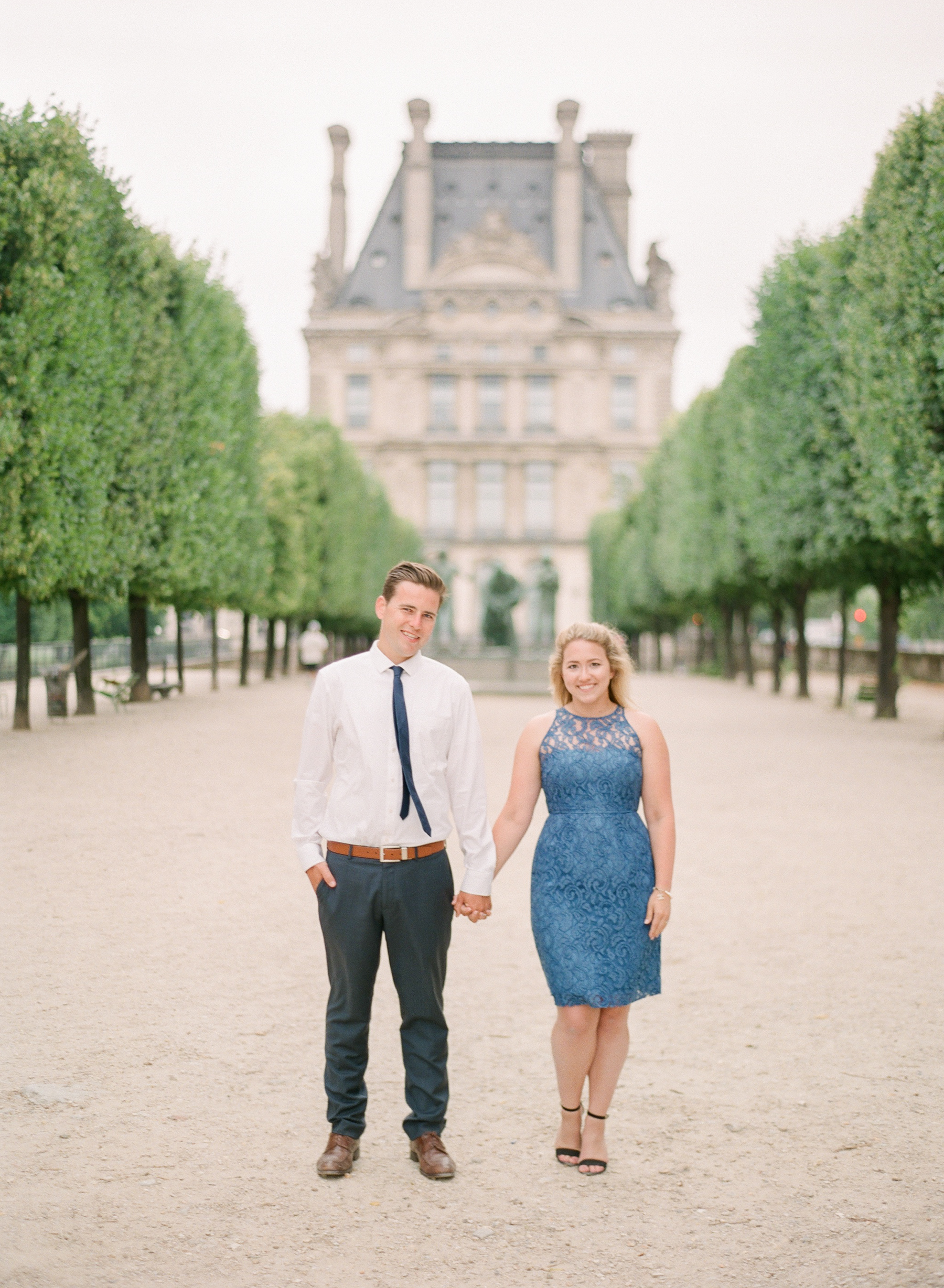 Paris Honeymoon Photographer | France Wedding Photographer | Paris Film Photography | Molly Carr Photography | Jardin Des Tuileries Engagement Session | Girl In Blue Lace JCrew Dress