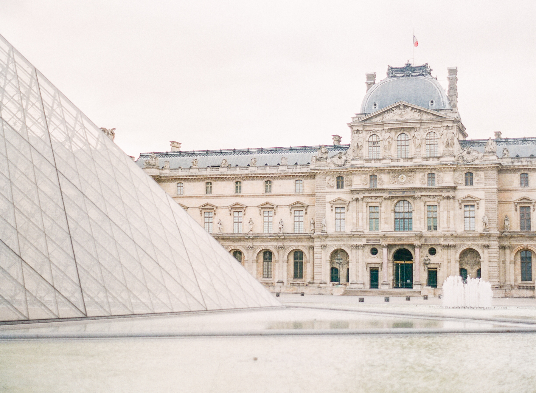 Paris Honeymoon Photographer | France Wedding Photographer | Paris Film Photography | Molly Carr Photography | Sunrise At Le Louvre | Louvre Glass Pyramid | Louvre Photography