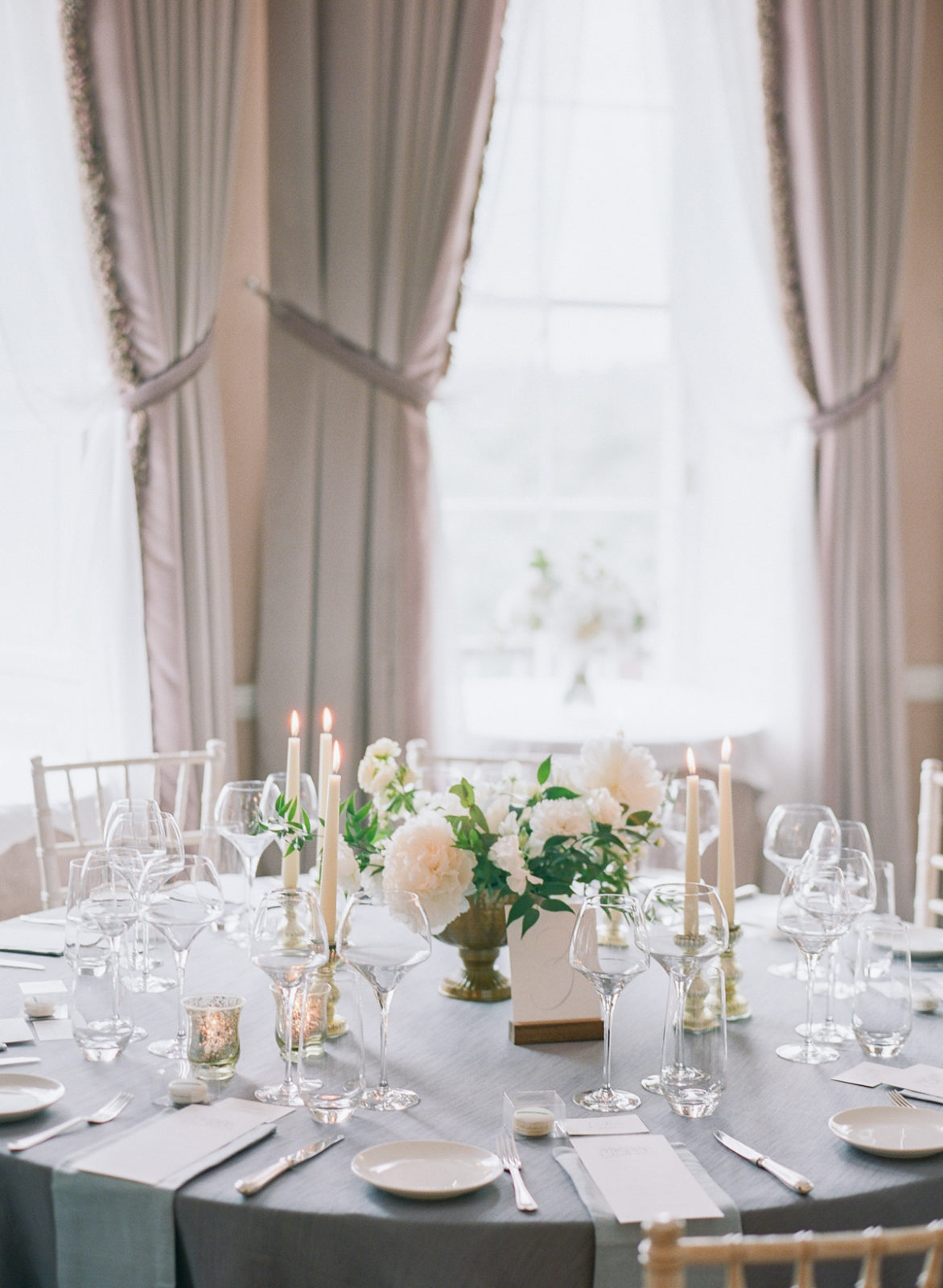 Ireland Film Photographer | Molly Carr Photography | Wedding Reception Decor with White Flowers on Candlelit Table