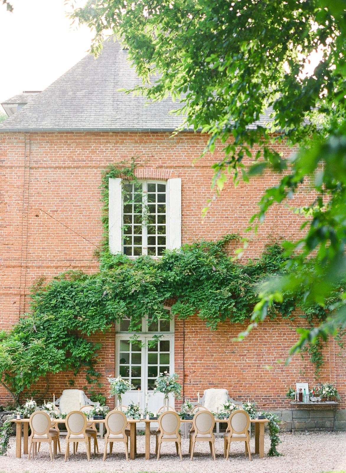 Normandy Wedding Photographer | France Destination Wedding | Molly Carr Photography | Wedding Flowers with Trophy and Old Books