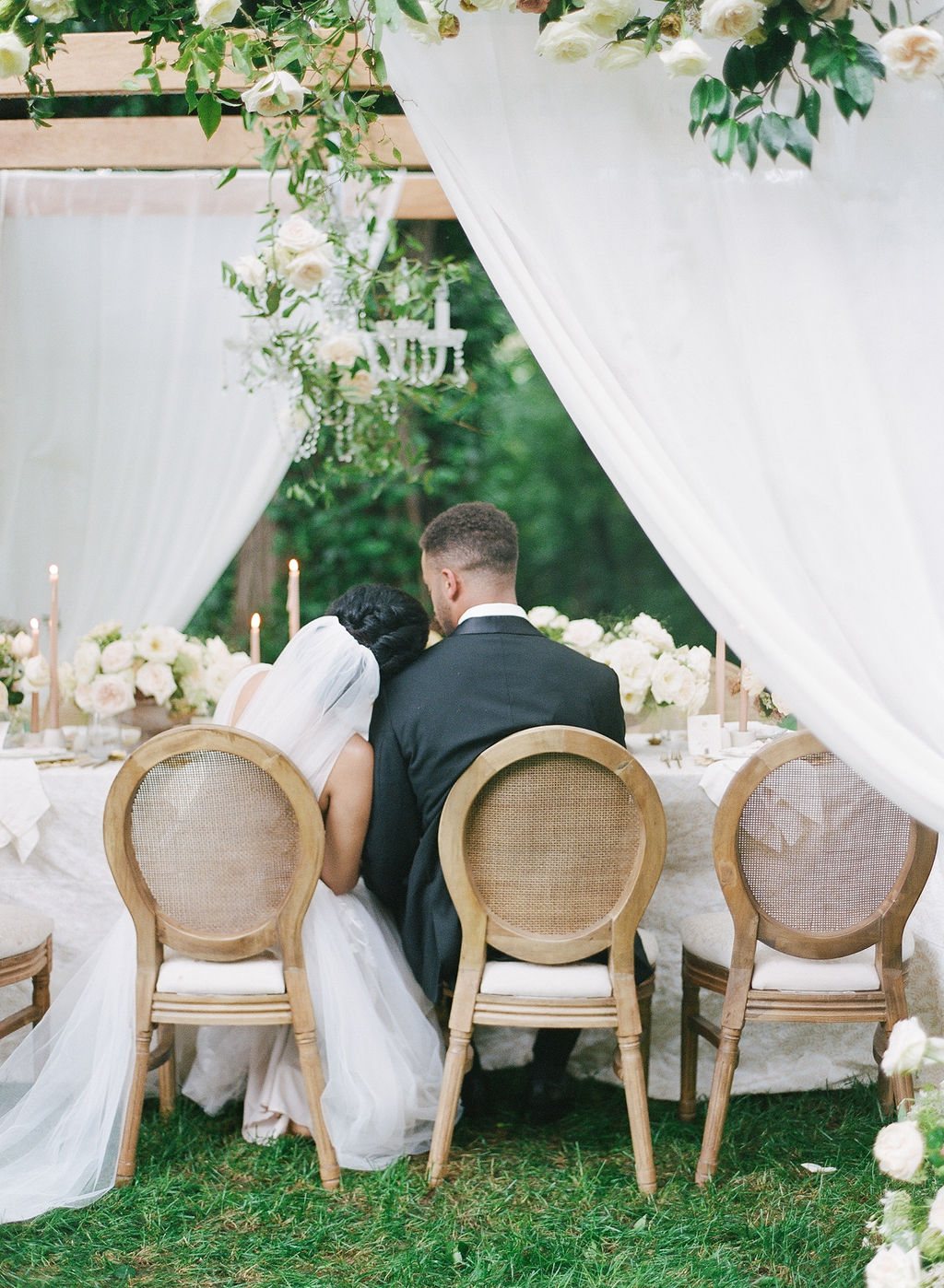 Elegant Microwedding Inspiration by Molly Carr Photography | Al Fresco Tented Dinner with Chandeliers & Flower Arch