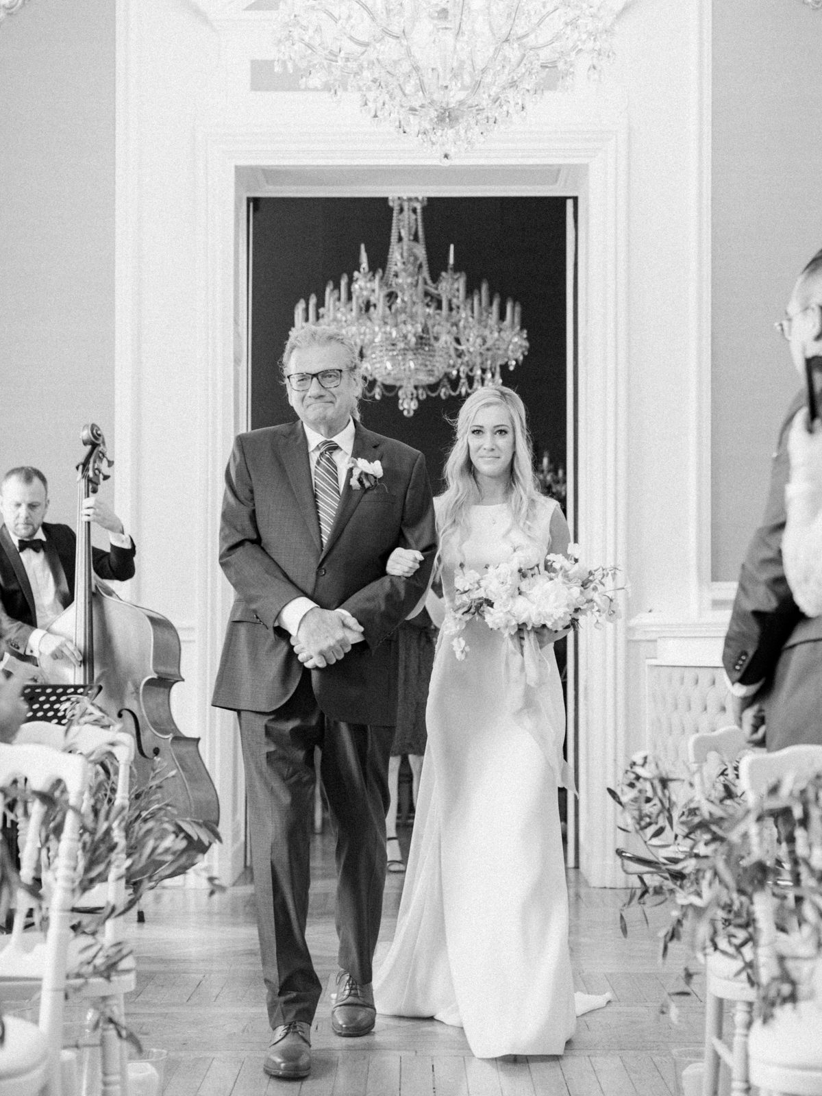 Chateau Bouffemont Wedding Photography | Paris, France Destination Wedding | Molly Carr Photography | Fine Art Film Photography | Jennifer Fox Weddings | Ceremony With Floral Arch by Floraison | Bride Walking Down Aisle