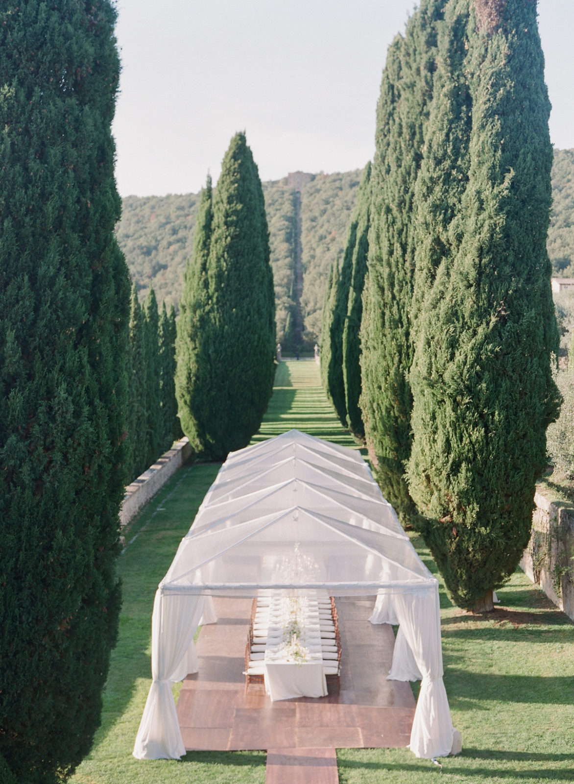 Villa Cetinale Wedding Photographer | Siena Wedding Venue | Tuscany Film Photographer | Italy Destination Wedding | Molly Carr Photography | White Wedding Reception with Clear Tent and Chandeliers
